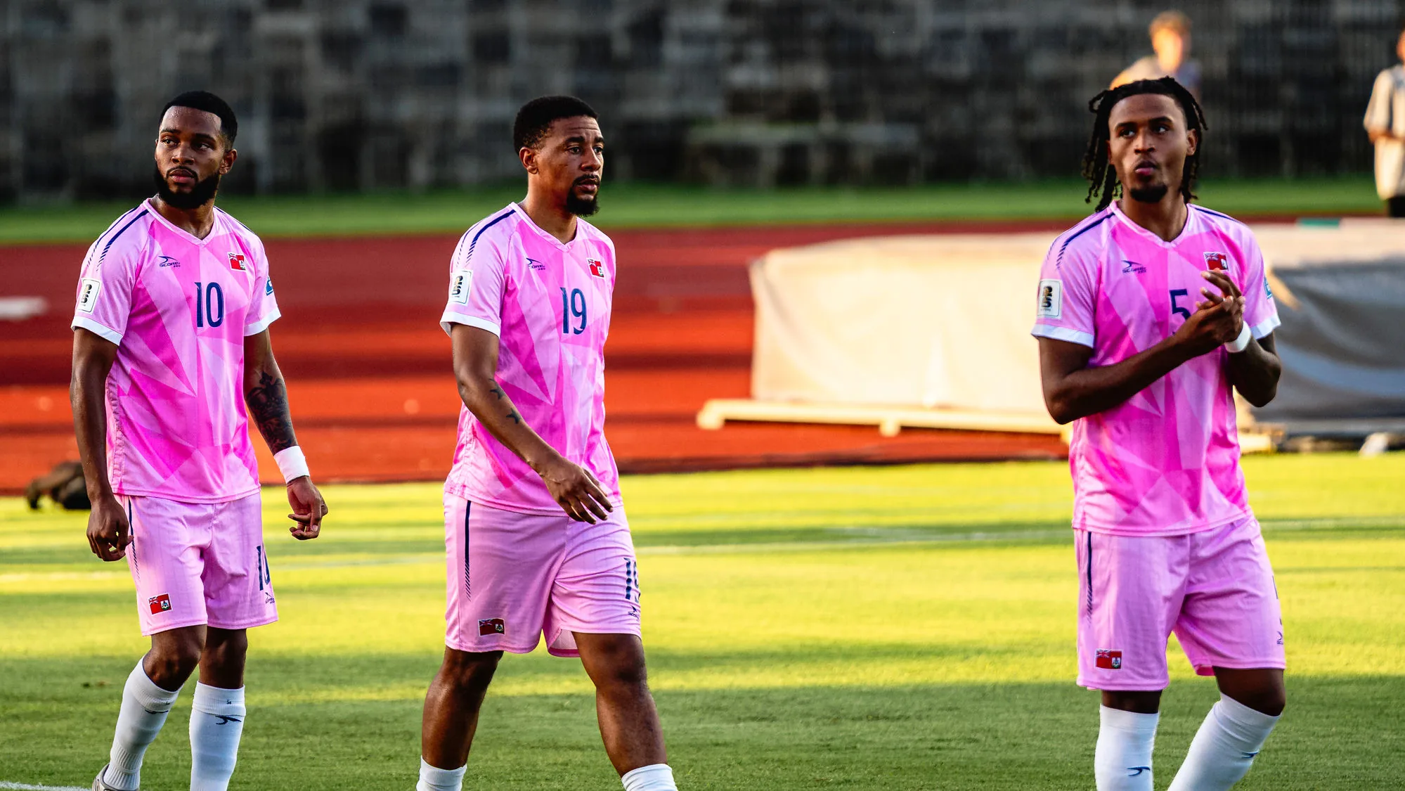 Bermuda players in pink jerseys